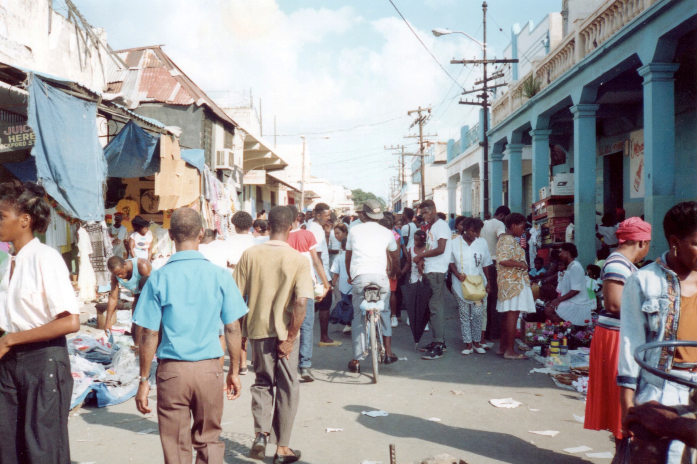 Traders, shoppers and stalls at a downtown Kingston market in Jamaica in 1990.