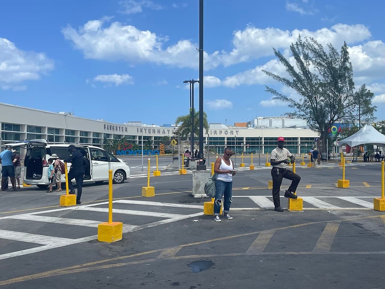 Entrance and parking area at Sangster International Airport in Montego Bay