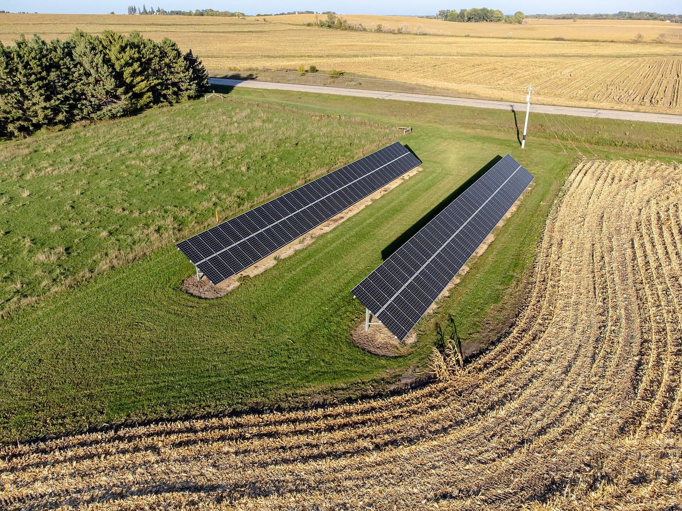 Solar panels on the edge of a farm