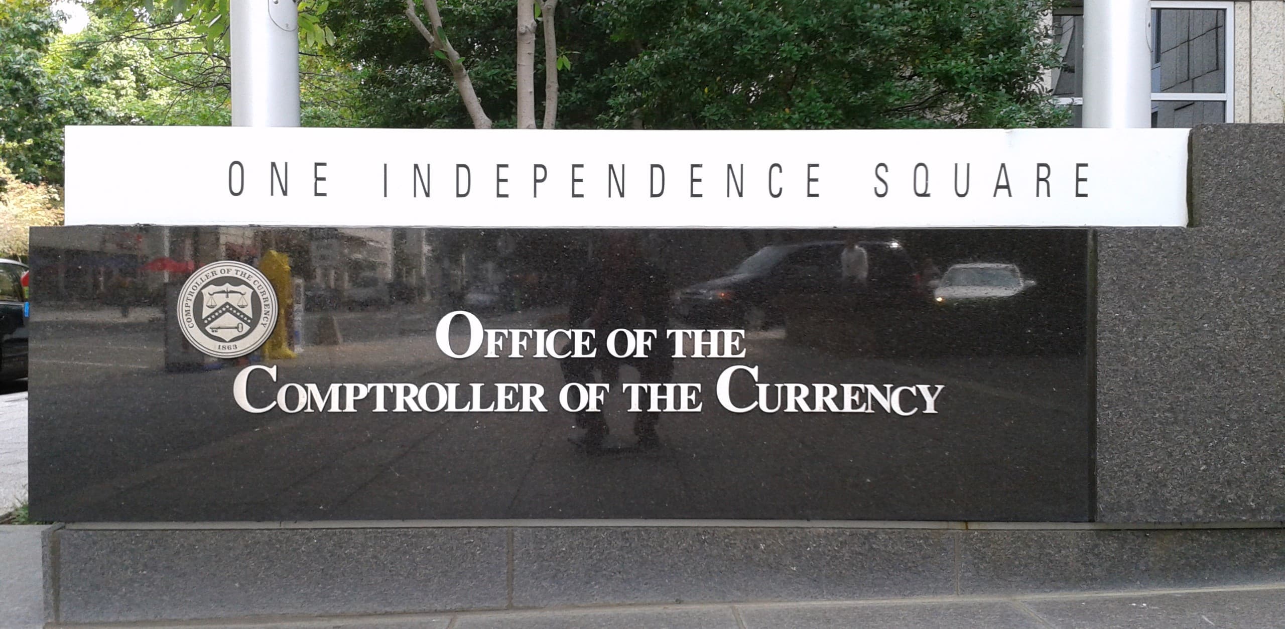 Office of the Comptroller of the Currency sign at One Independence Square